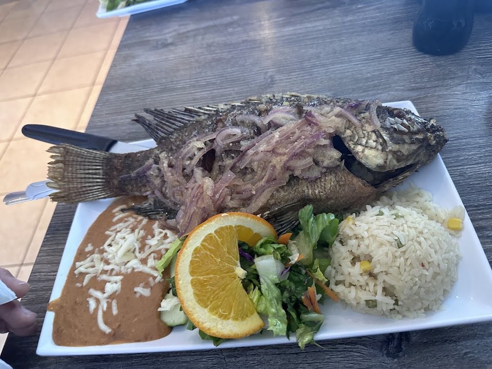 Seafood menu with cocktails and tostadas.