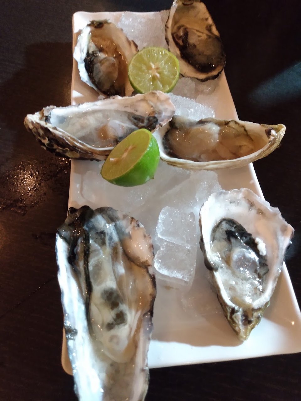 Seafood menu with cocktails and tostadas.