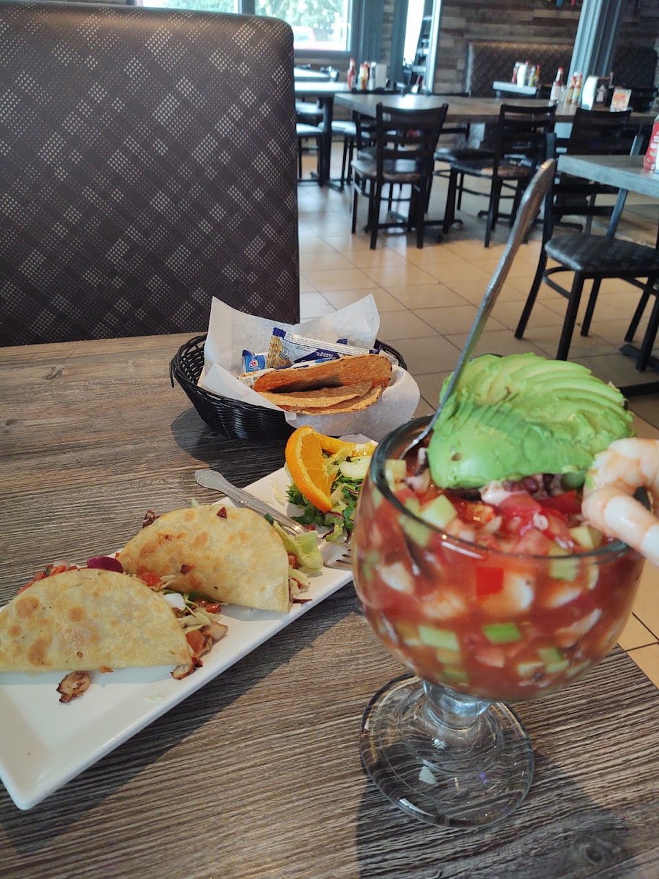 Seafood menu with cocktails and tostadas.